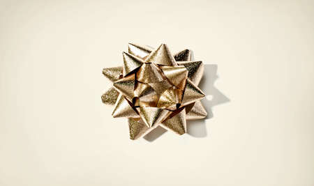 Christmas gift bow overhead view - flat lay