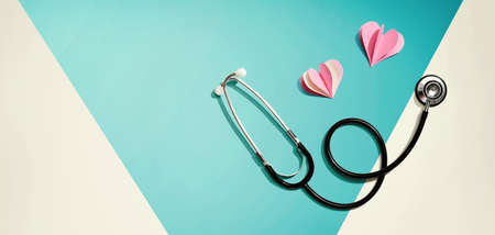 Medical worker appreciation theme with hearts and a stethoscopeの写真素材