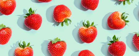 Fresh red strawberries overhead view - flat layの写真素材