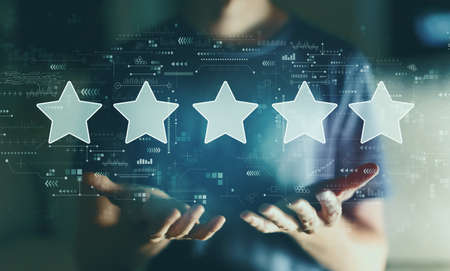 Rating star concept with young man in the night