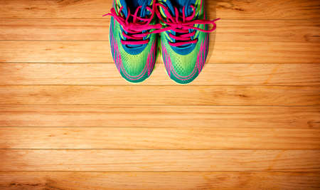 Pair of sport shoes with pink lacesの写真素材