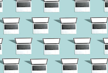 Many Laptop computers with shadowの写真素材