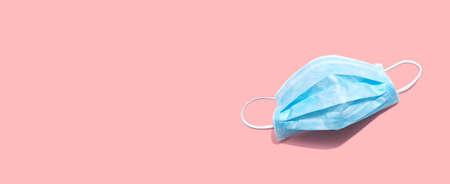 Blue surgical mask overhead view