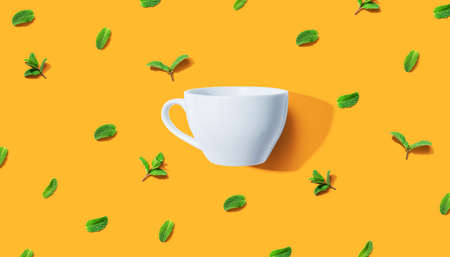 Fresh mints with tea cup overhead viewの写真素材
