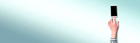 Person using a smartphoneの写真素材