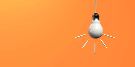 Hanging Idea light bulb on a colored backgroundの写真素材