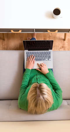 Young woman using her laptopの写真素材
