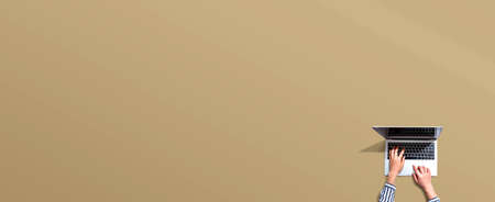 Person using a laptop computerの写真素材