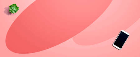 Smartphone with a succulent plantの写真素材