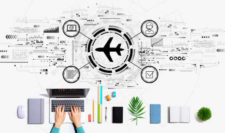 Flight ticket booking concept with person using a laptopの写真素材