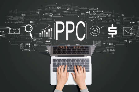 PPC - Pay per click concept with person using laptopの写真素材