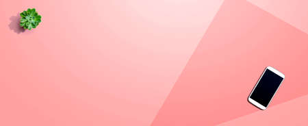 Smartphone with a succulent plantの写真素材