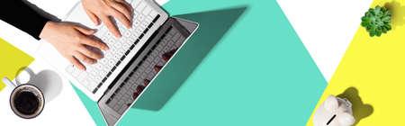 Person using a laptop computerの写真素材