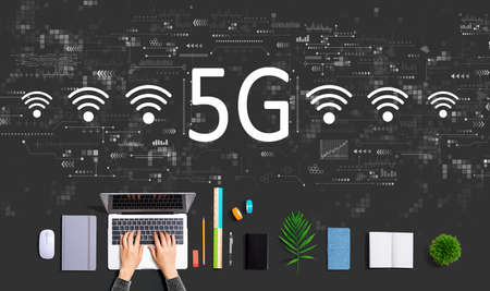 5G network with person using a laptopの写真素材