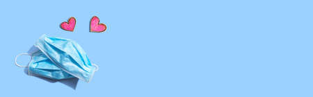 Medical worker appreciation theme with hearts and face maskの写真素材