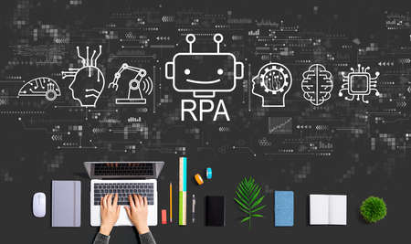 Robotic Process Automation theme with person using a laptopの写真素材