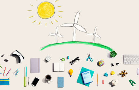 Windmills theme with electronic gadgets and office supplies