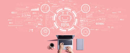 Robotic Process Automation theme with person working with laptopの写真素材