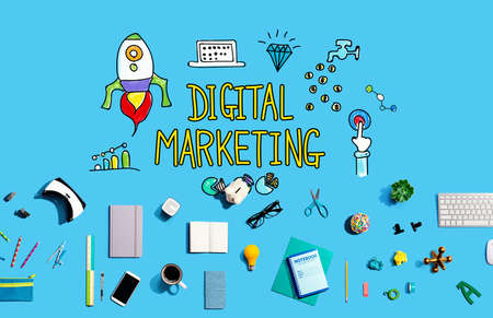 Digital marketing with electronic gadgets and office suppliesの写真素材