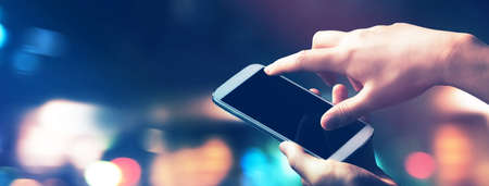 Person using a smartphoneの写真素材