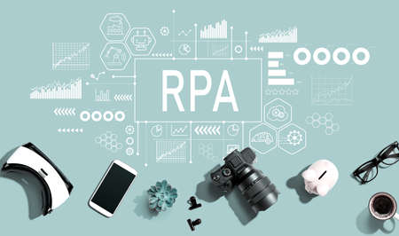 Robotic Process Automation theme with electronic gadgets and office suppliesの写真素材