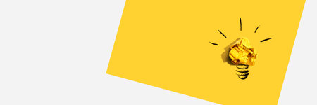 Brainstorming concept with a crumpled paper light bulbの写真素材