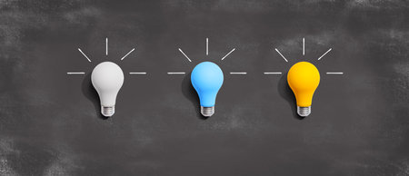 Idea and creativity concept with white, blue and yellow light bulbs