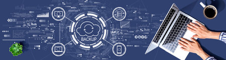 Backup concept with person using a laptop