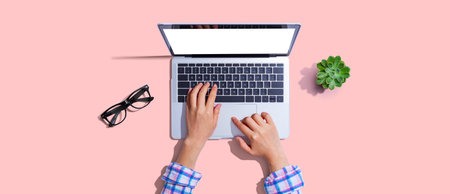 Person using a laptop computerの写真素材