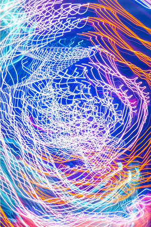 Abstract blurred bokeh neon light trails background