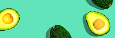 Fresh avocado halves overhead view