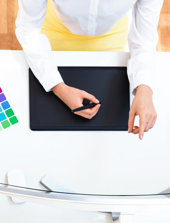 Graphic designer using her graphic tabletの写真素材