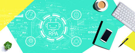 Robotic Process Automation theme with computer keyboard and office itemsの写真素材