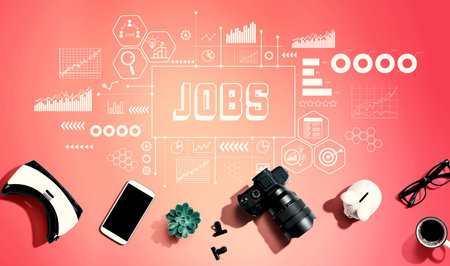 Job theme with electronic gadgets and office suppliesの写真素材
