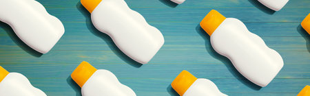 Yellow and white sunblock bottlesの写真素材