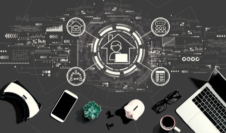 Remote Work theme with electronic gadgets and office suppliesの写真素材