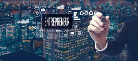 Entrepreneur theme with businessman in city at nightの写真素材