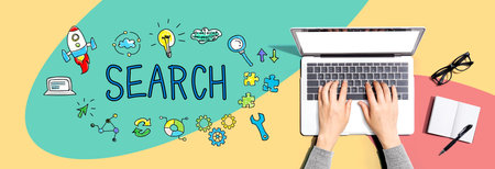 Search with person using a laptopの写真素材