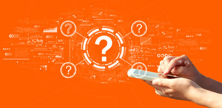 Question marks with person using a smartphoneの写真素材