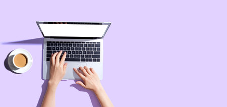 Person using a laptop computerの写真素材