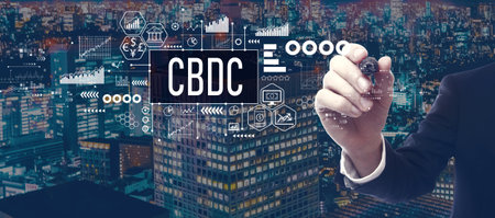 CBDC theme with businessman in city at nightの写真素材