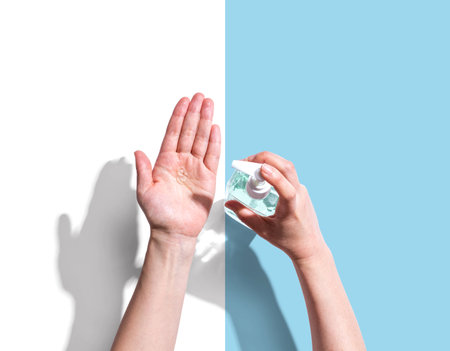 Applying sanitizer gelの写真素材