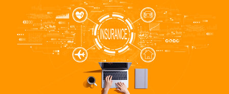 Insurance concept with person working with laptopの写真素材