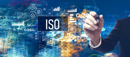 ISO theme with businessman in a bokeh neon light trails city backgroundの写真素材