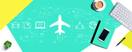 Flight ticket booking concept with computer keyboard and office itemsの写真素材