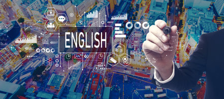 Learning English concept with businessman in city at nightの写真素材