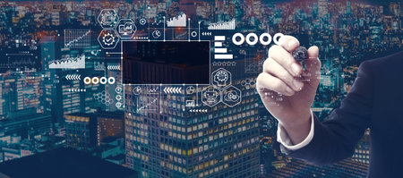 Digital Transformation concept with businessman in city at nightの写真素材