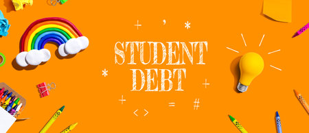 Student Debt theme with school supplies - flat layの写真素材