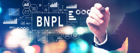 BNPL - Buy Now Pay Later theme with a businessman holding a markerの写真素材