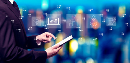 Business growth analysis with businessman using a tablet computerの写真素材